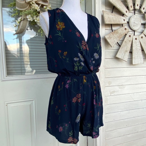 As U Wish Pants - Surplice Navy Blue Floral Print Sleeveless Romper